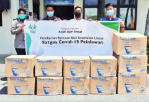 Asian Agri salurkan Bantuan Masker dan Vitamin ke Satgas Covid-19 Pelalawan