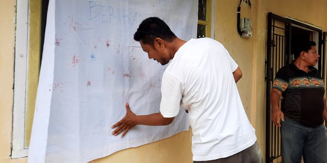 kampar cap jempol darah