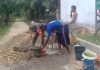Jalin Kebersamaan, Babinsa 14/Rtp Bantu Bangun Gapura Dayah